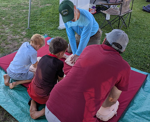 People Demonstrating CPR